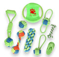 A set of nine colorful dog toys including various knotted rope chews and a green disc.