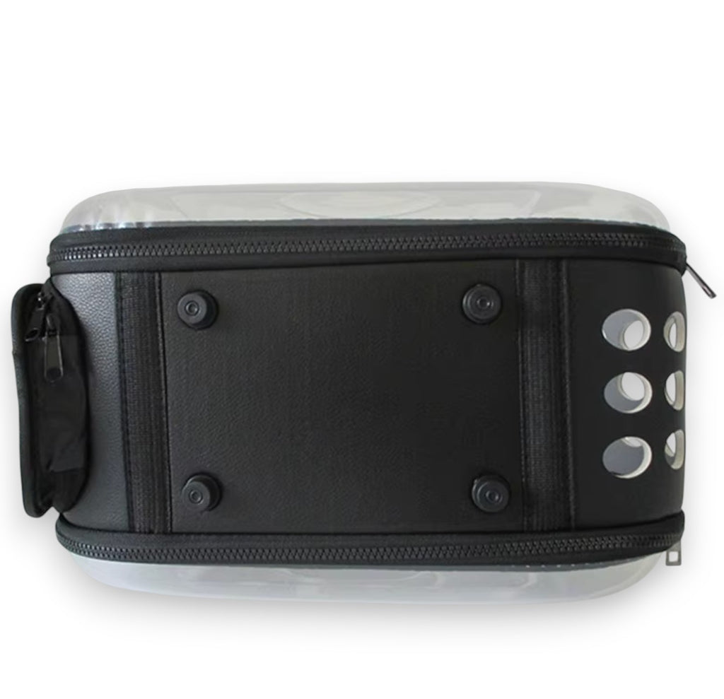 Black and clear portable pet carrier with a textured midsection, clear top and bottom panels, zippers, and side ventilation holes.