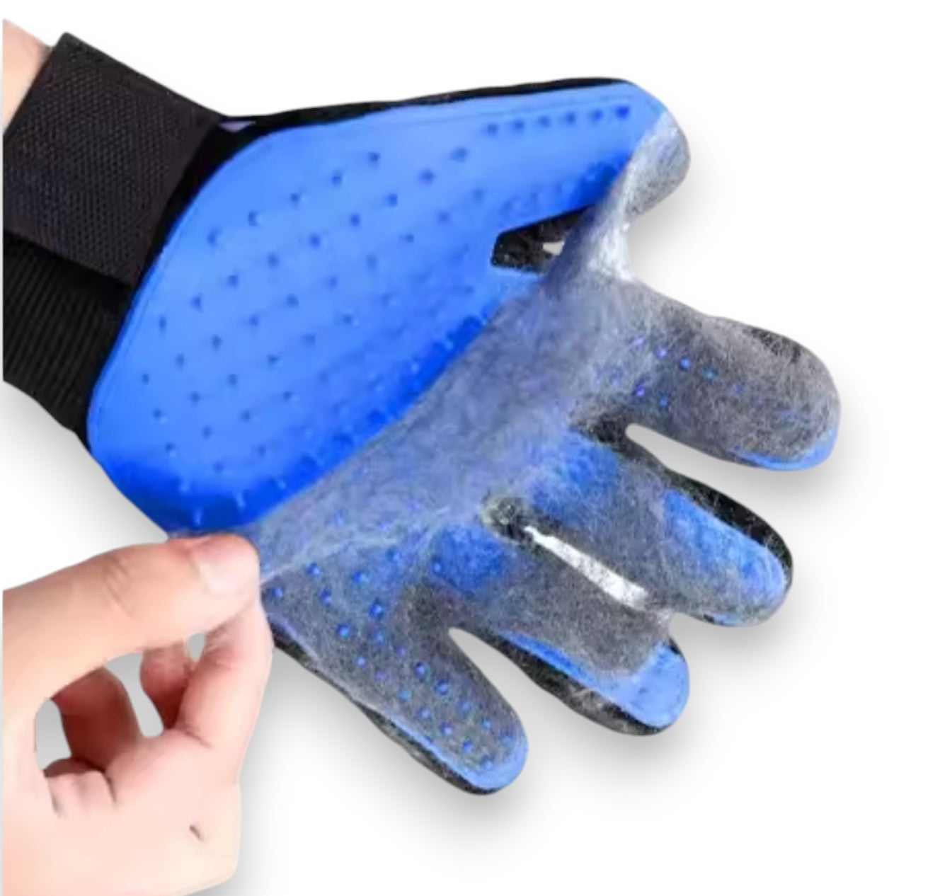 Blue and black pet grooming glove with silicone nubs, shown collecting and removing pet hair.